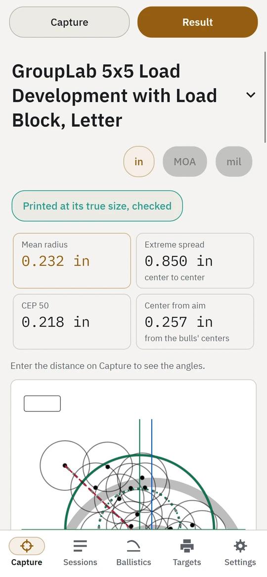 A real 25-shot group on a GroupLab sheet, read on the phone, with its figures beneath it